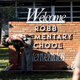A Texas State Trooper receives flowers for the victims of a mass shooting Tuesday at Robb Elementary School where 21 people were killed, including 19 children, on May 25, 2022 in Uvalde, Texas.